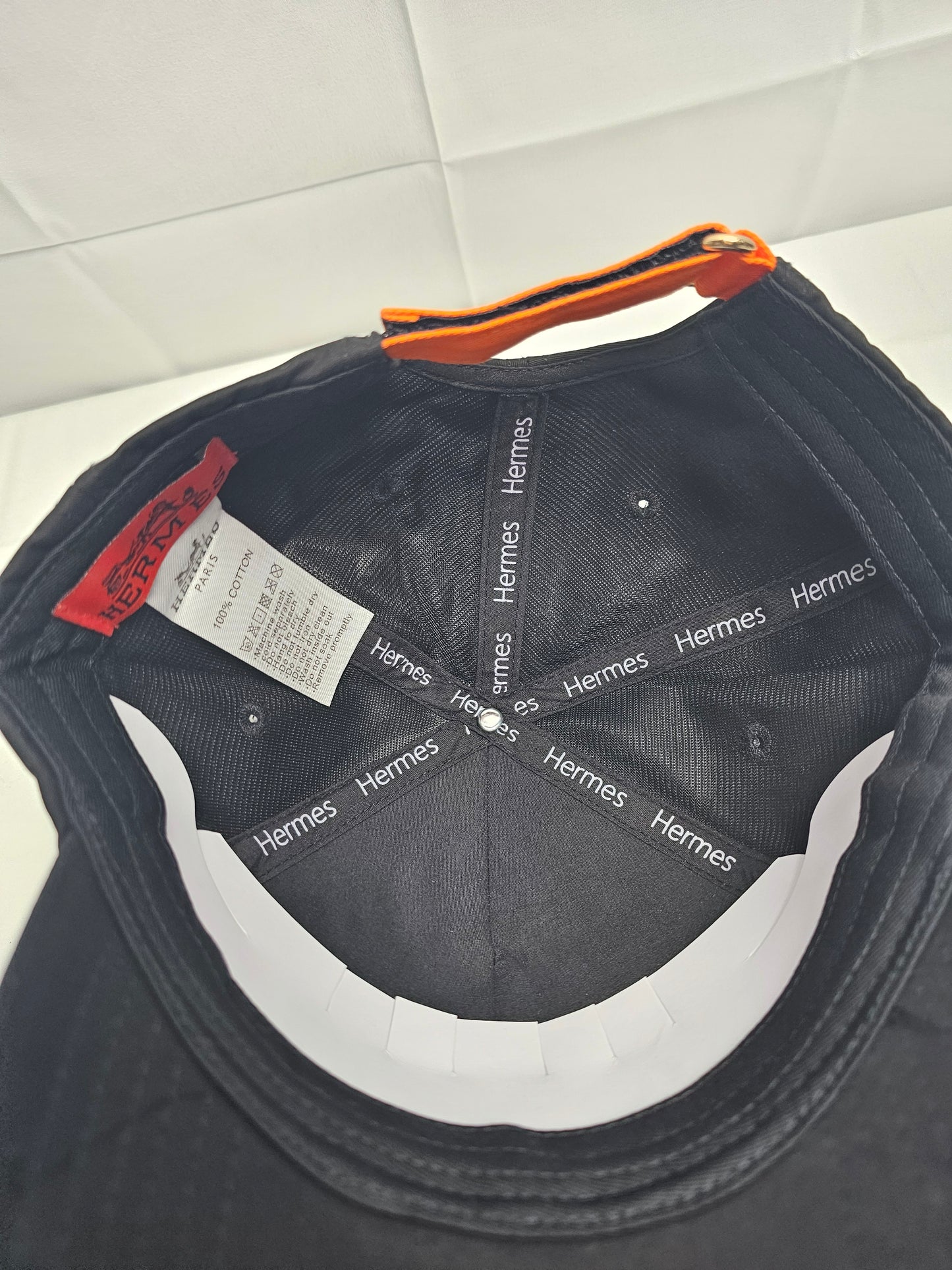 Herm Black Big Orange Logo Hat