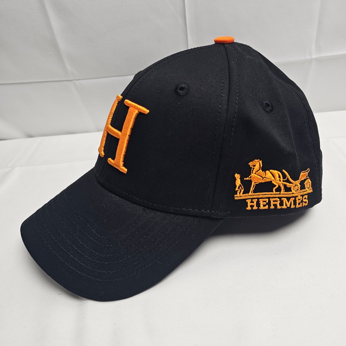 Herm Black Big Orange Logo Hat