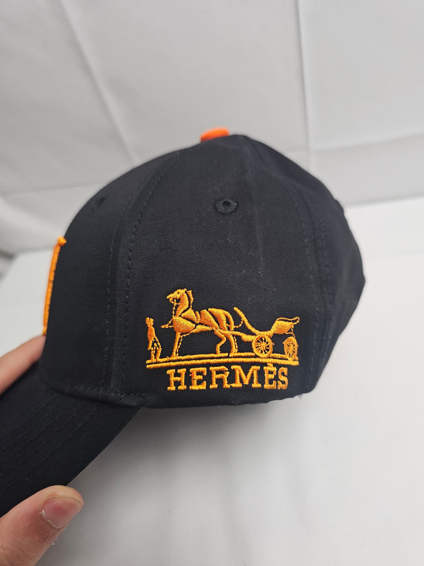 Herm Black Big Orange Logo Hat