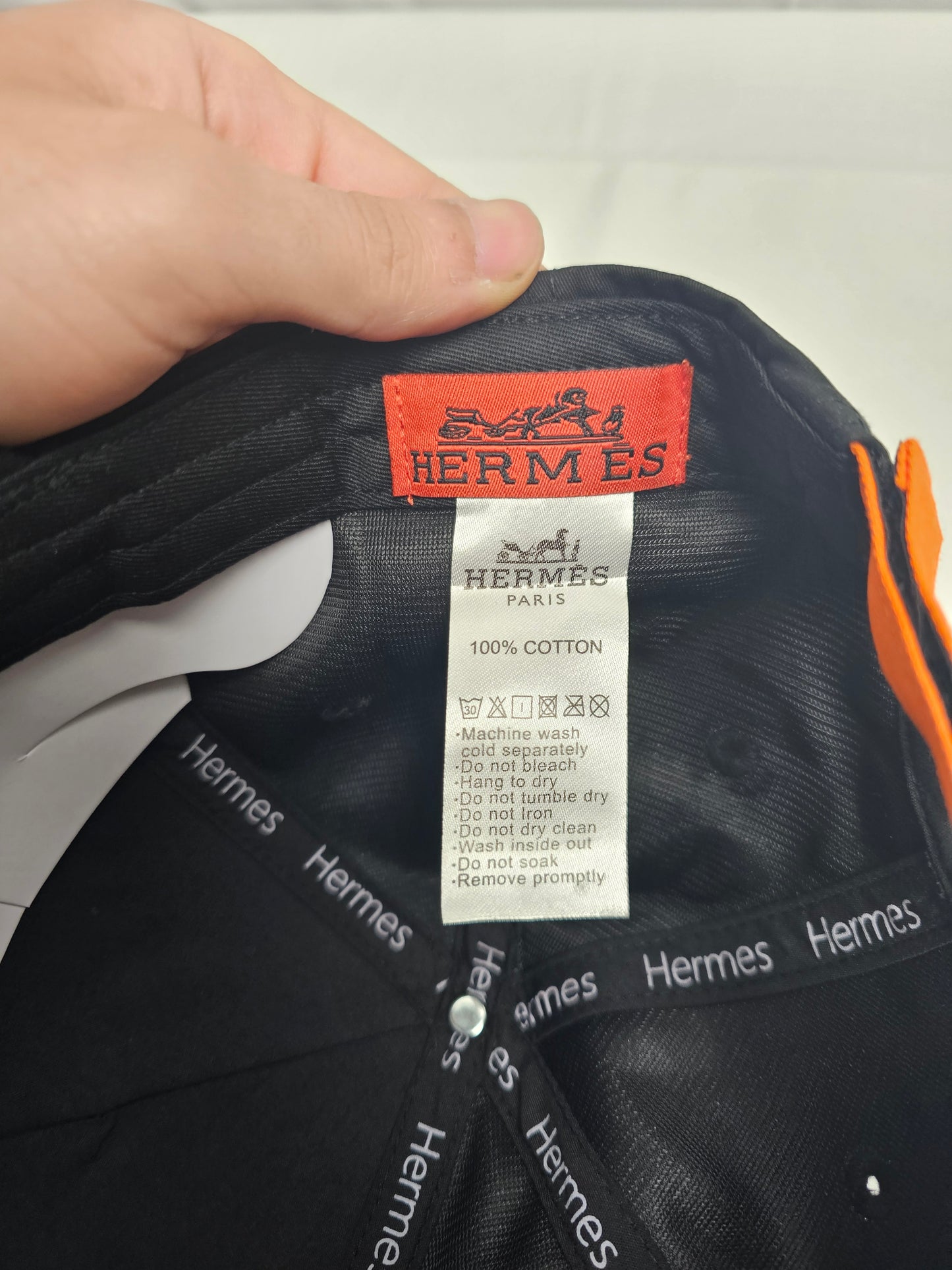 Herm Black Big Orange Logo Hat